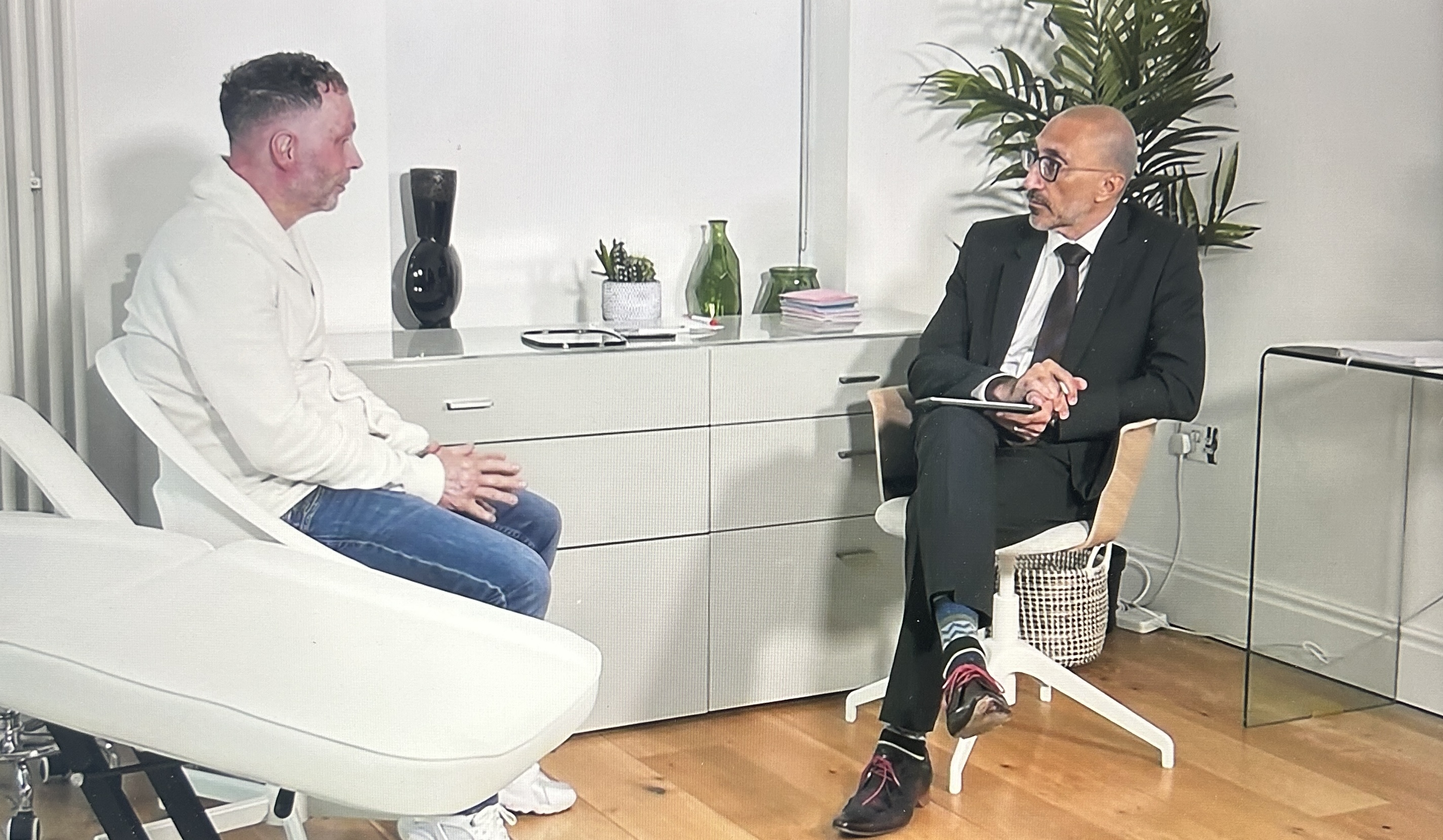 Dr Bessam Farjo having a consultation with Terry Dunnage about eyebrow and hair transplants. 